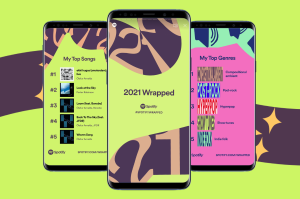 Three cellphones showing different pages of a 2021 Spotify Wrapped